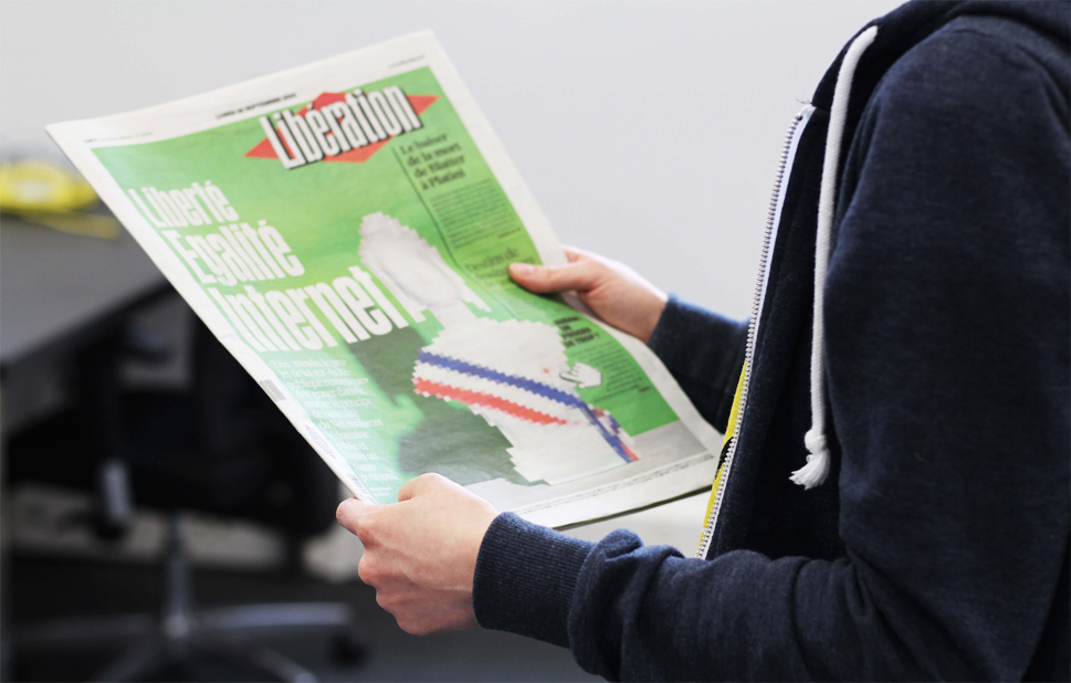 Le journal Libération, dans les mains dun ceur